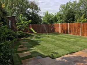 brand new lawn with a patio