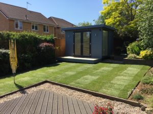 brand new turf laid in a garden with home office