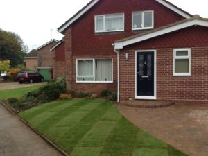 brand new lawn laid in a residential front garden